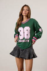 Brooklyn Long Sleeve Graphic Jersey | Forever 21 Womens